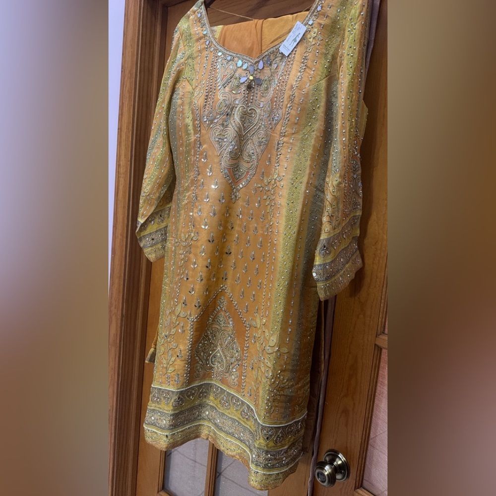 Yellow and orange mirror work crepe suit